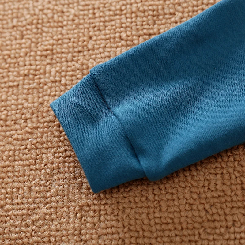 Macacão Bebê Dinossauro Azul em Algodão detalhe 5 Raizza Kids